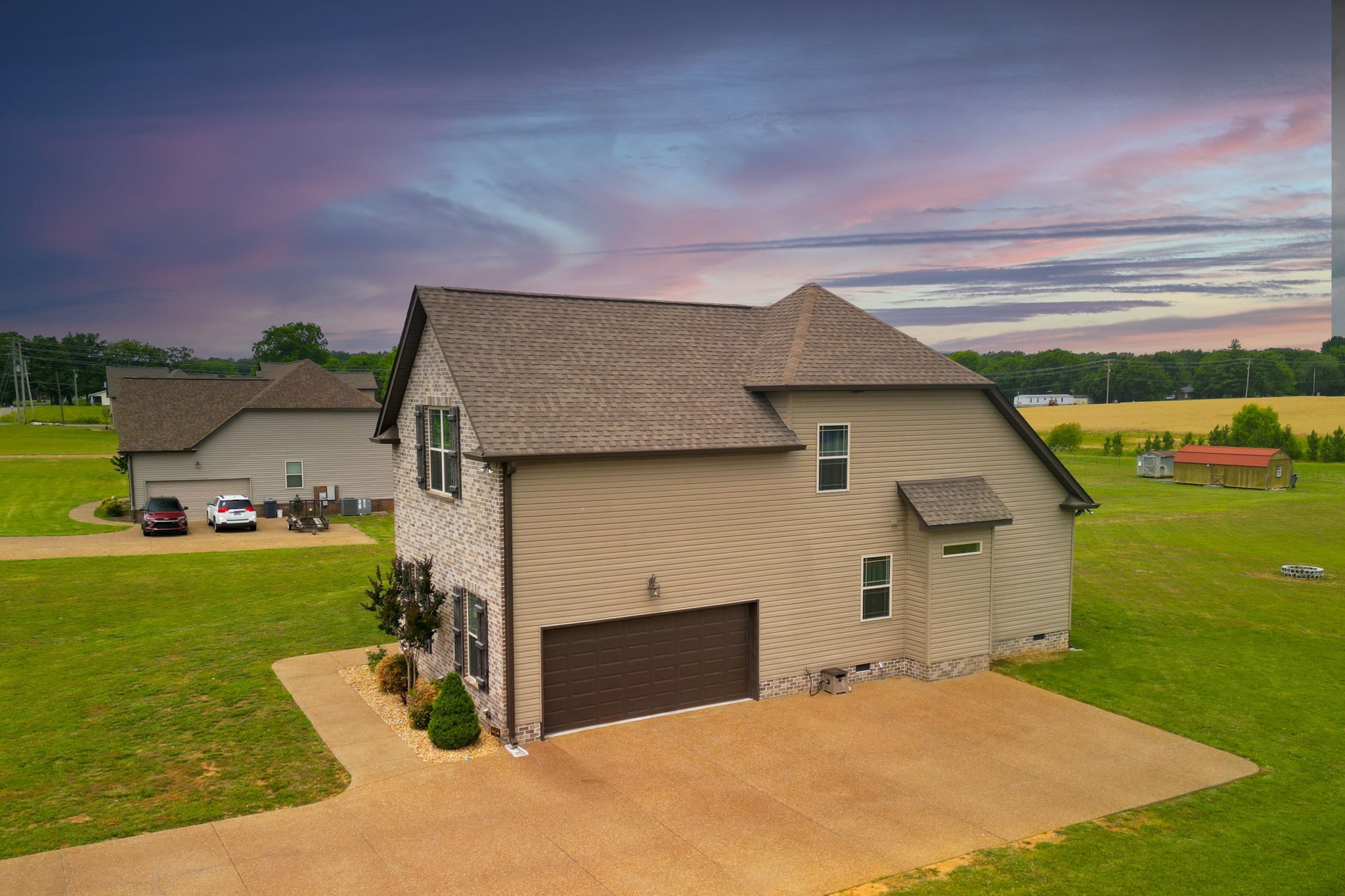 2251 Bluebird Road Lebanon, TN 37087 - Photo 2 of 2 a front view of a house with a yard and garage