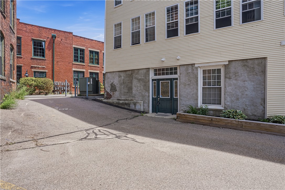 148 Bernon Street, Unit 7 Woonsocket, RI 02895 - Photo 2 of 49 Private Ground Floor Entry
