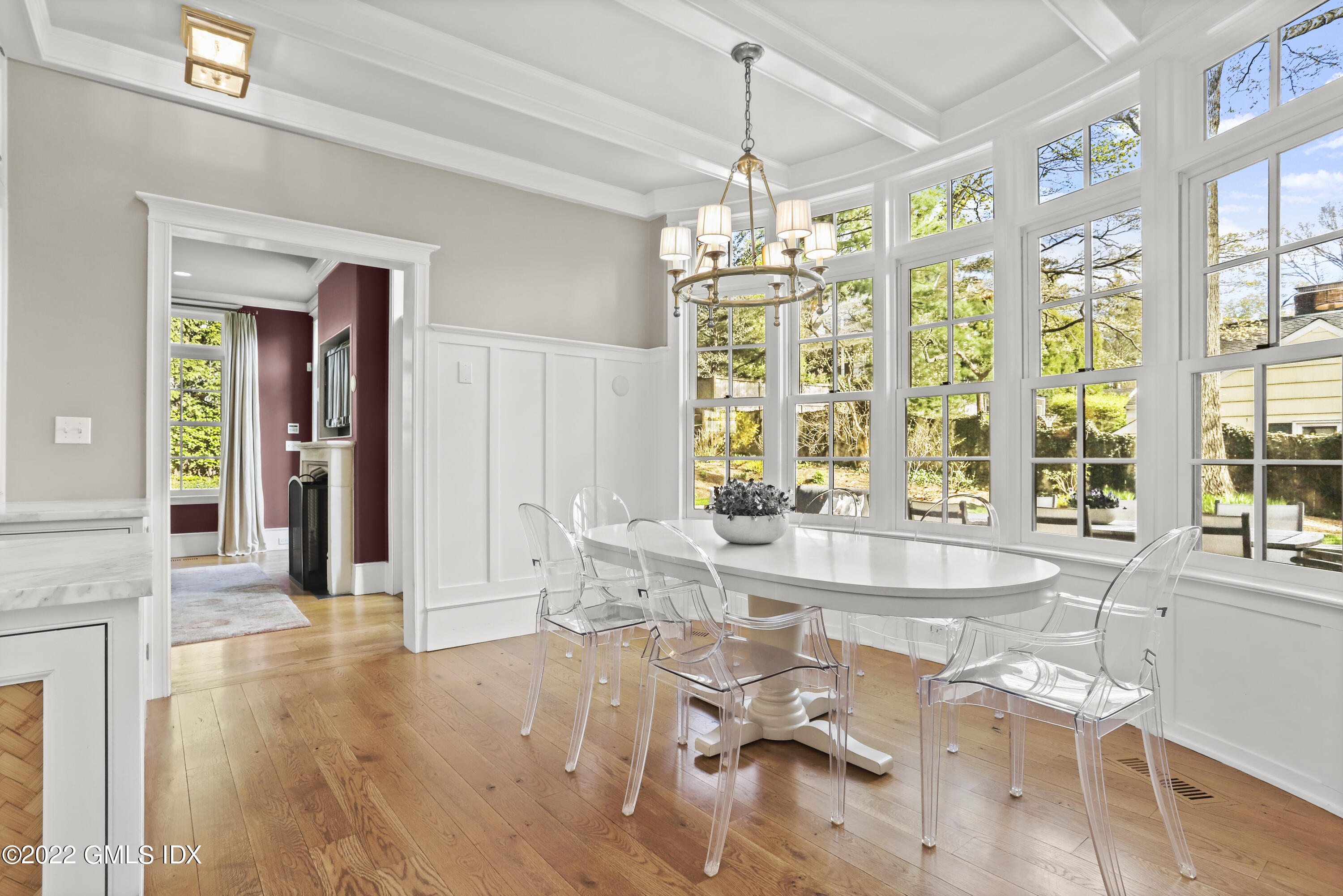 22 Glen Road Greenwich, CT 06830 - Photo 11 of 30 a view of a dining room with furniture wooden floor and chandelier