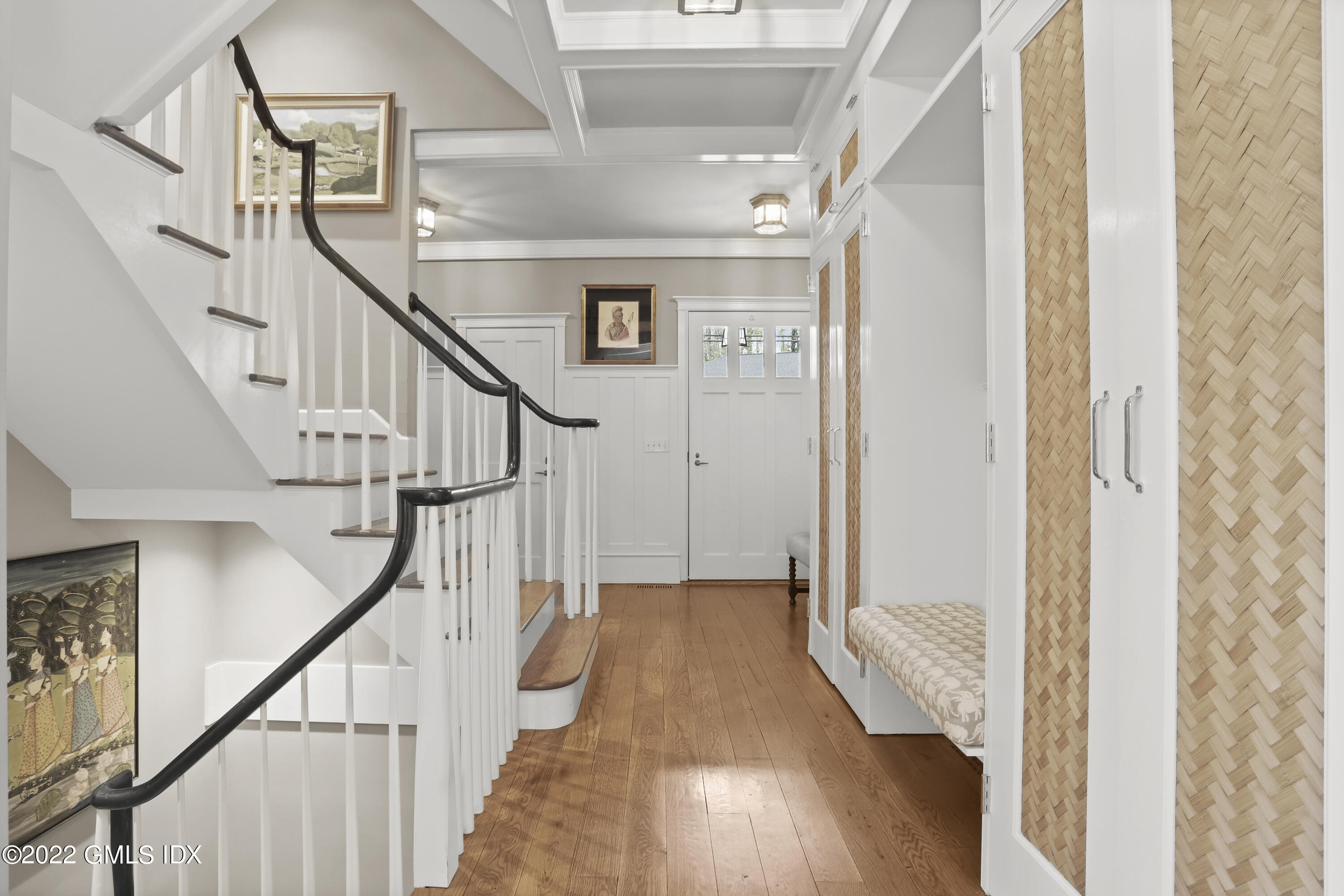 22 Glen Road Greenwich, CT 06830 - Photo 8 of 30 a view of hallway with wooden floor and stairs