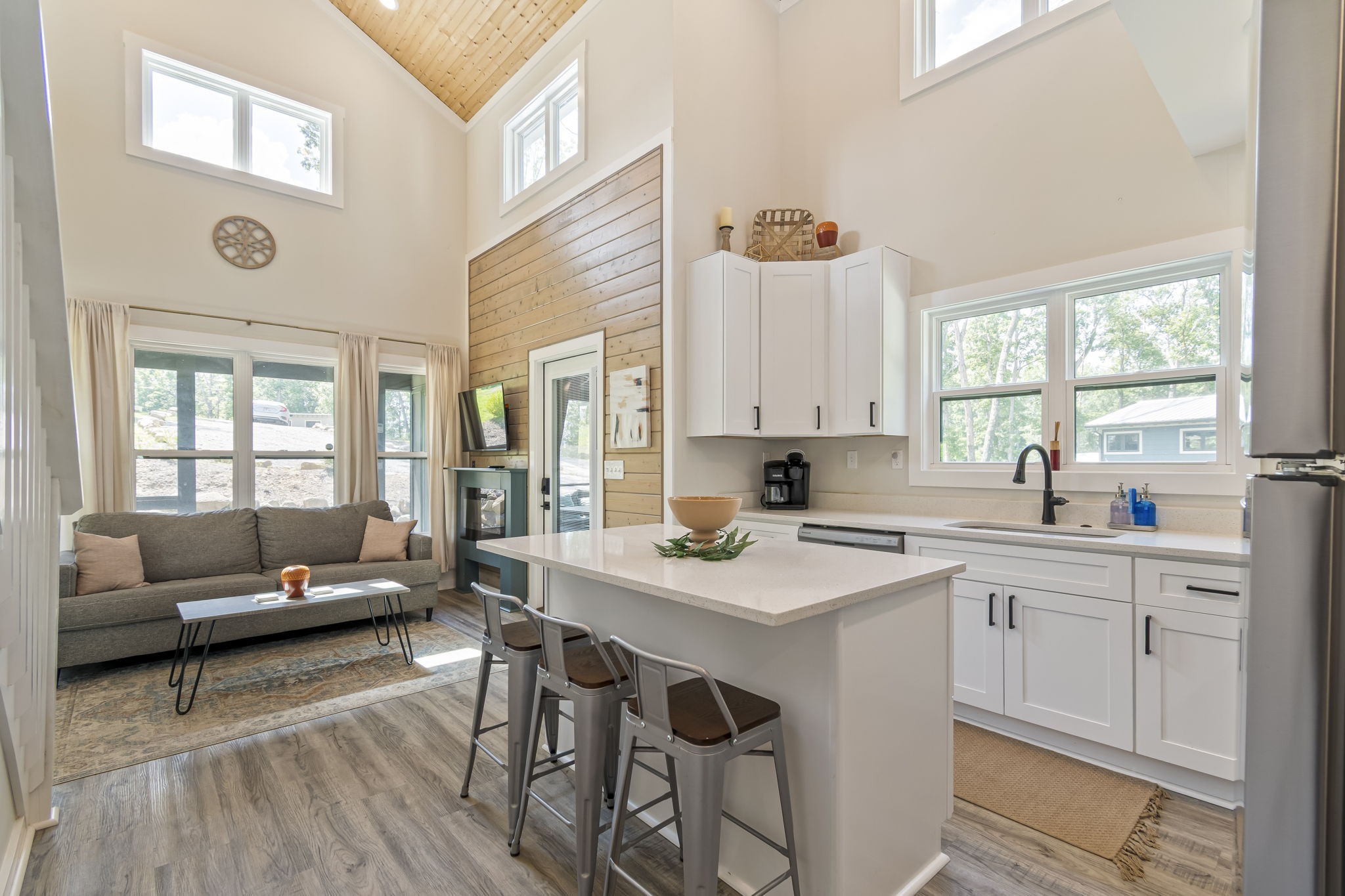 232 Waters Edge Way Tracy City, TN 37387 - Photo 15 of 62 a kitchen with a table chairs stove and cabinets