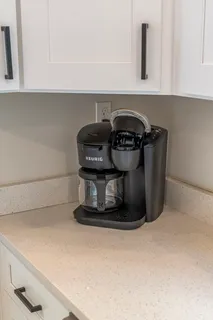a kitchen with a sink stove and refrigerator