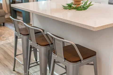 a kitchen with stainless steel appliances a stove a microwave and cabinets