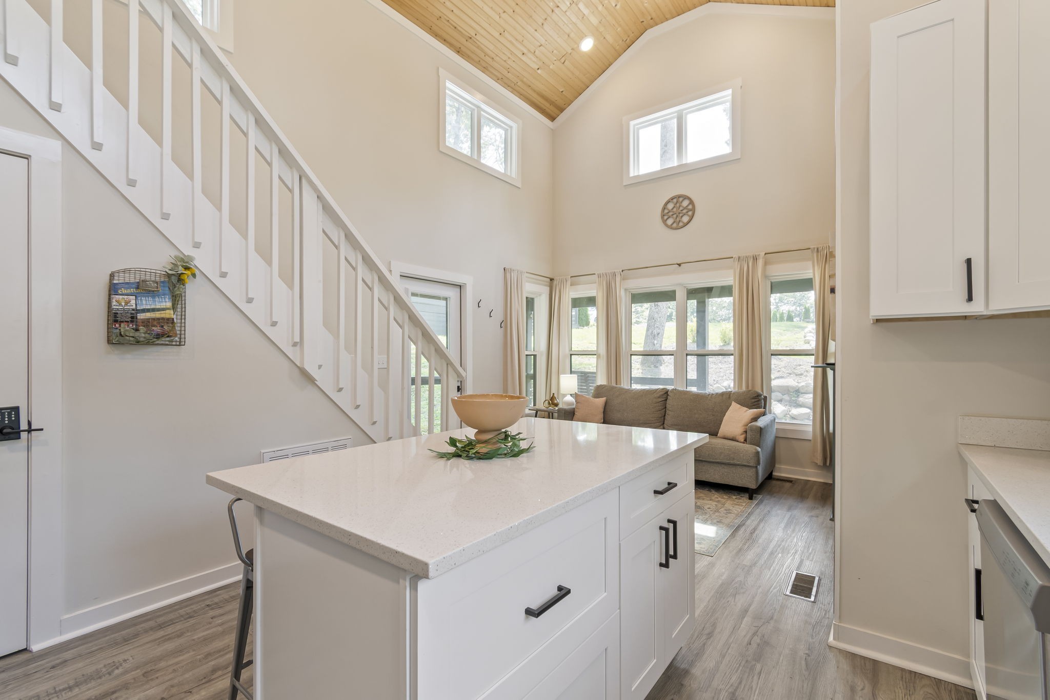 232 Waters Edge Way Tracy City, TN 37387 - Photo 18 of 62 a living room with couches and a large mirror with wooden floor