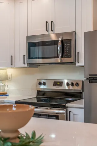 a view of dresser with wooden floor