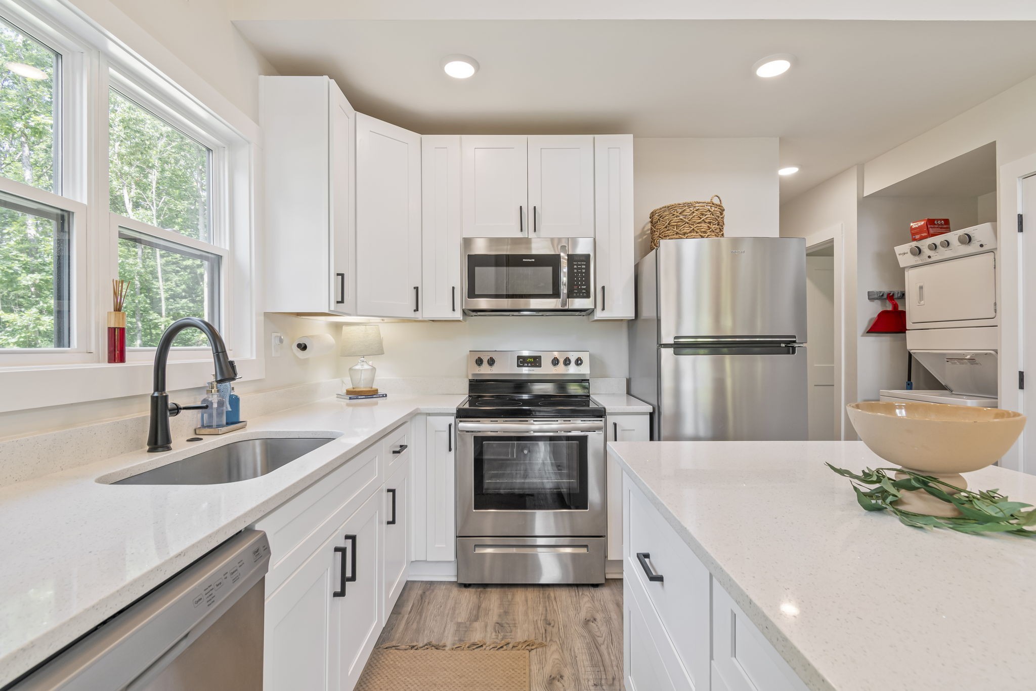 232 Waters Edge Way Tracy City, TN 37387 - Photo 20 of 63 a kitchen with a sink stove and refrigerator