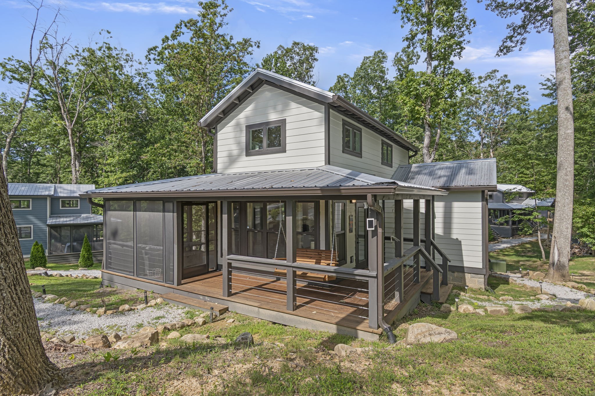 232 Waters Edge Way Tracy City, TN 37387 - Photo 2 of 62 a view of a house with backyard wooden and wooden fence