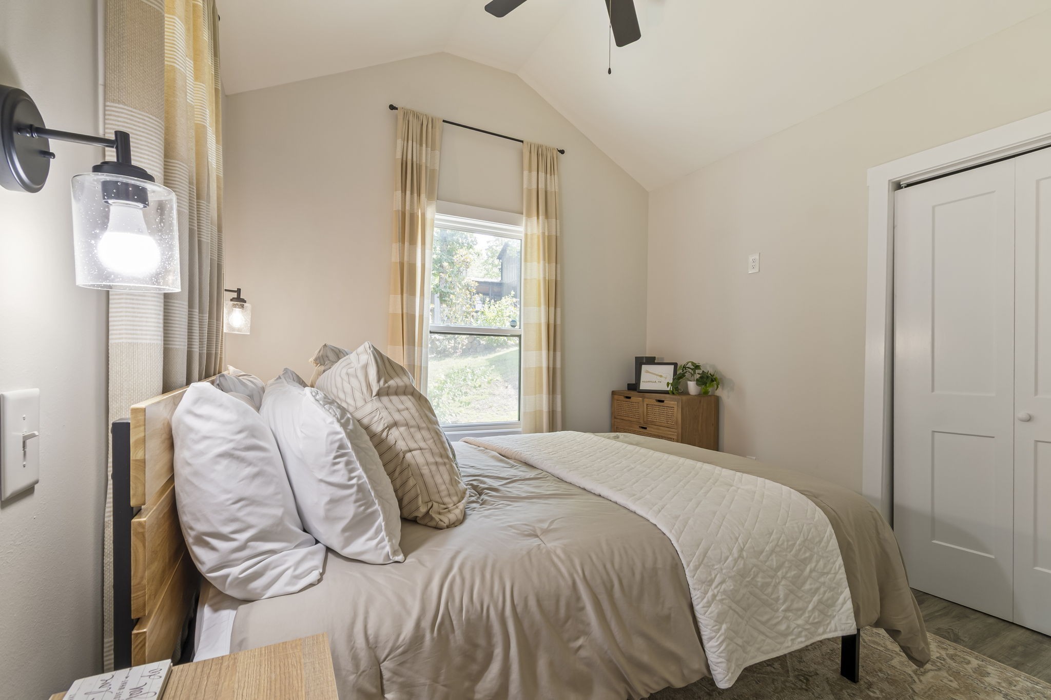 232 Waters Edge Way Tracy City, TN 37387 - Photo 23 of 62 a bedroom with a bed and a window