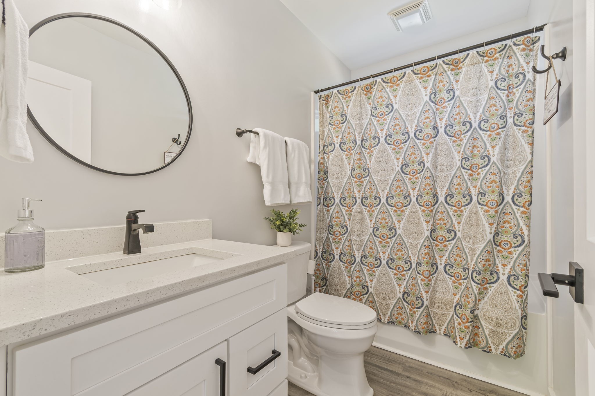 232 Waters Edge Way Tracy City, TN 37387 - Photo 26 of 62 a bathroom with a sink a toilet and a mirror