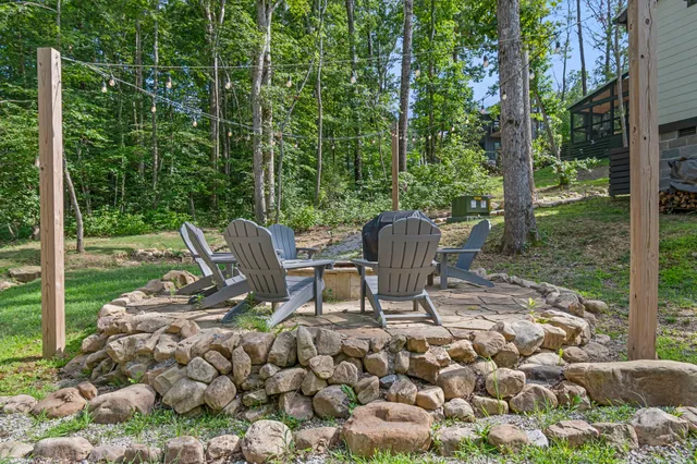 a view of a chairs and table in the garden