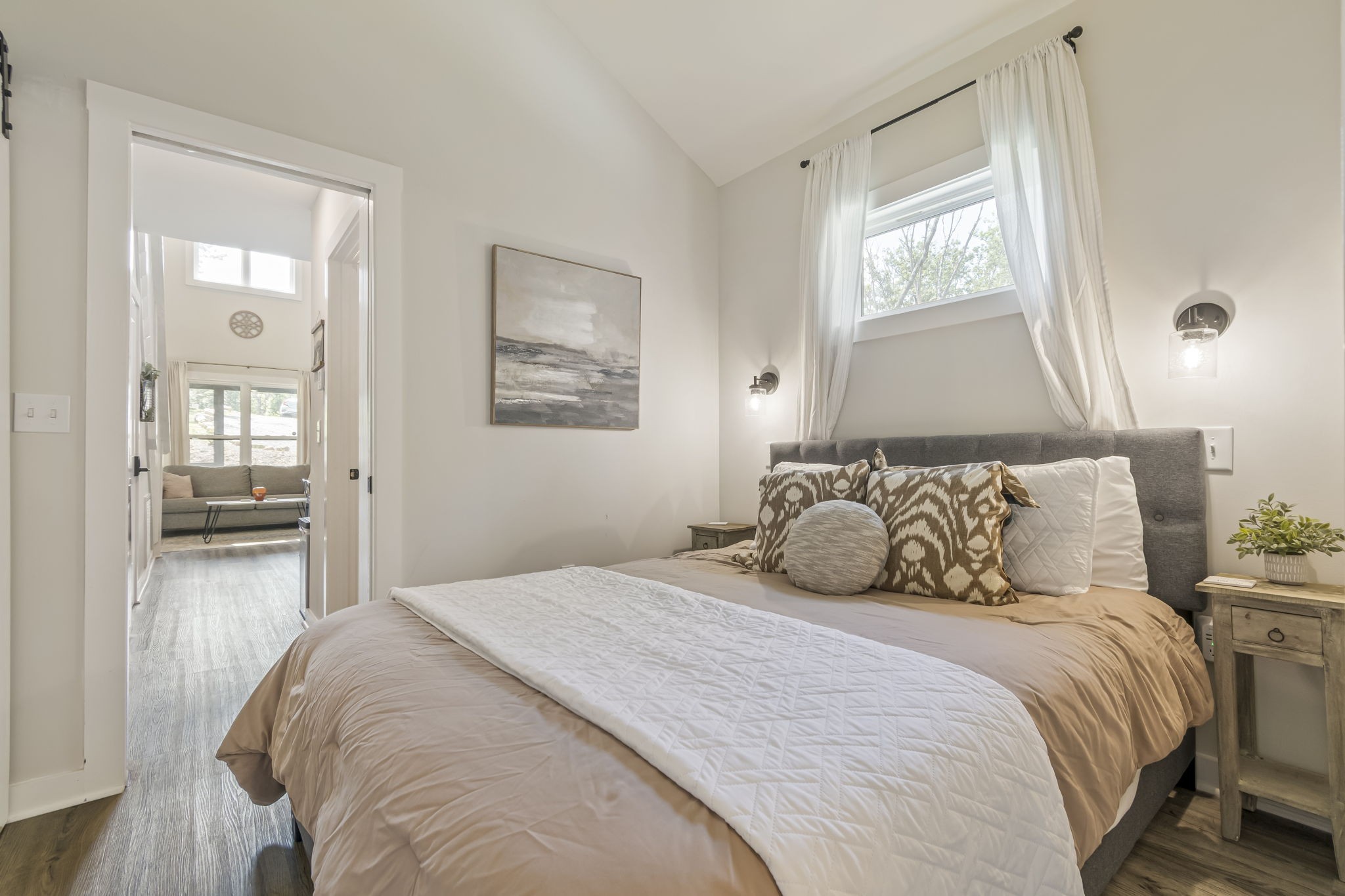 232 Waters Edge Way Tracy City, TN 37387 - Photo 32 of 63 a bedroom with a large bed and a window