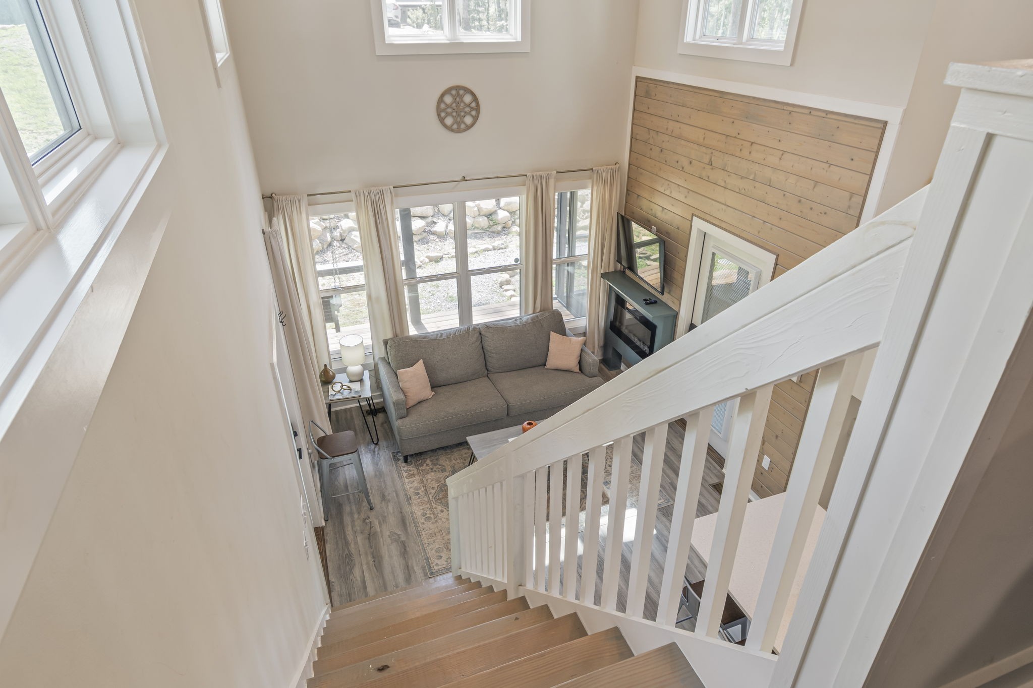 232 Waters Edge Way Tracy City, TN 37387 - Photo 36 of 62 a view of staircase with furniture and a window
