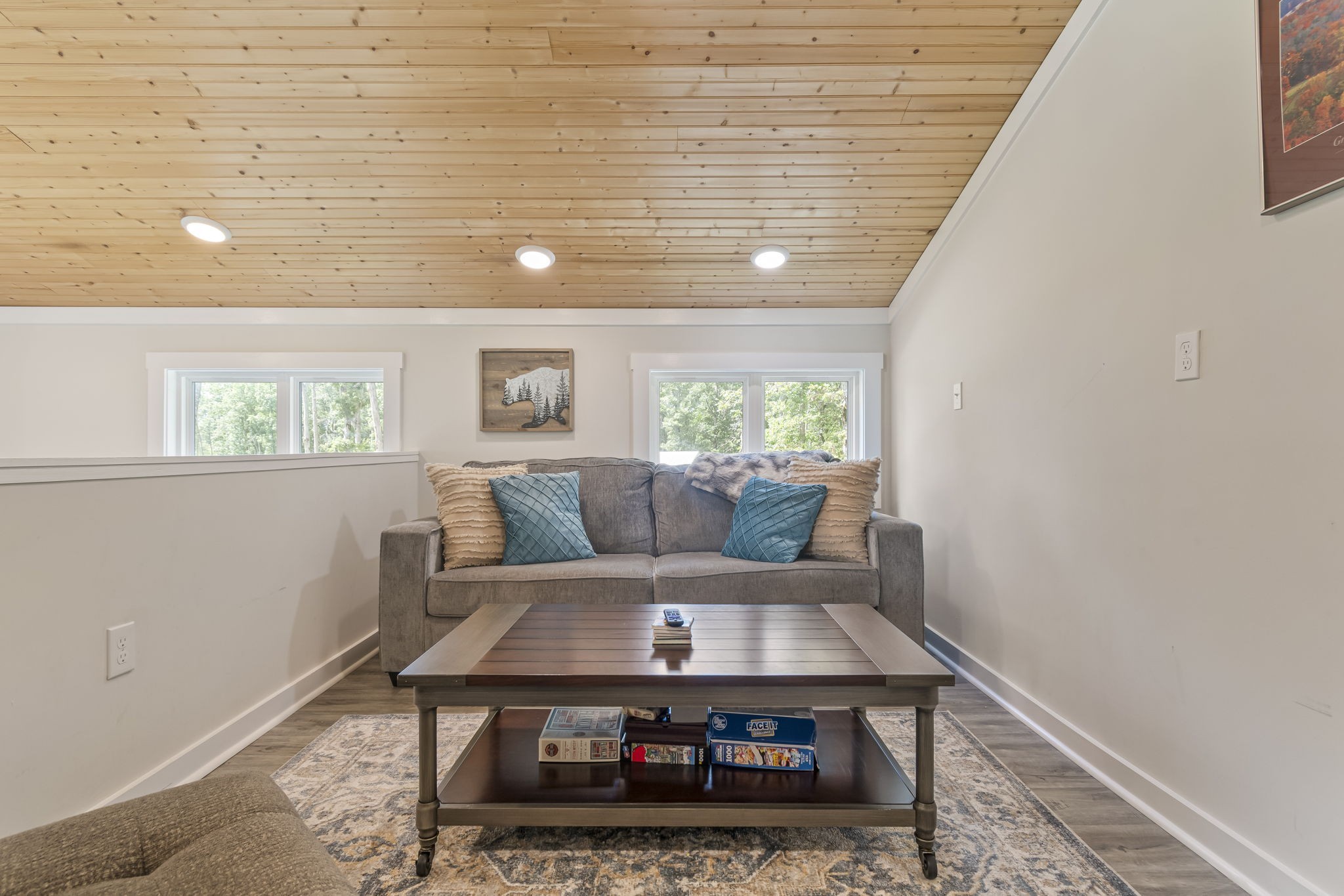 232 Waters Edge Way Tracy City, TN 37387 - Photo 37 of 62 a living room with a couch and a table