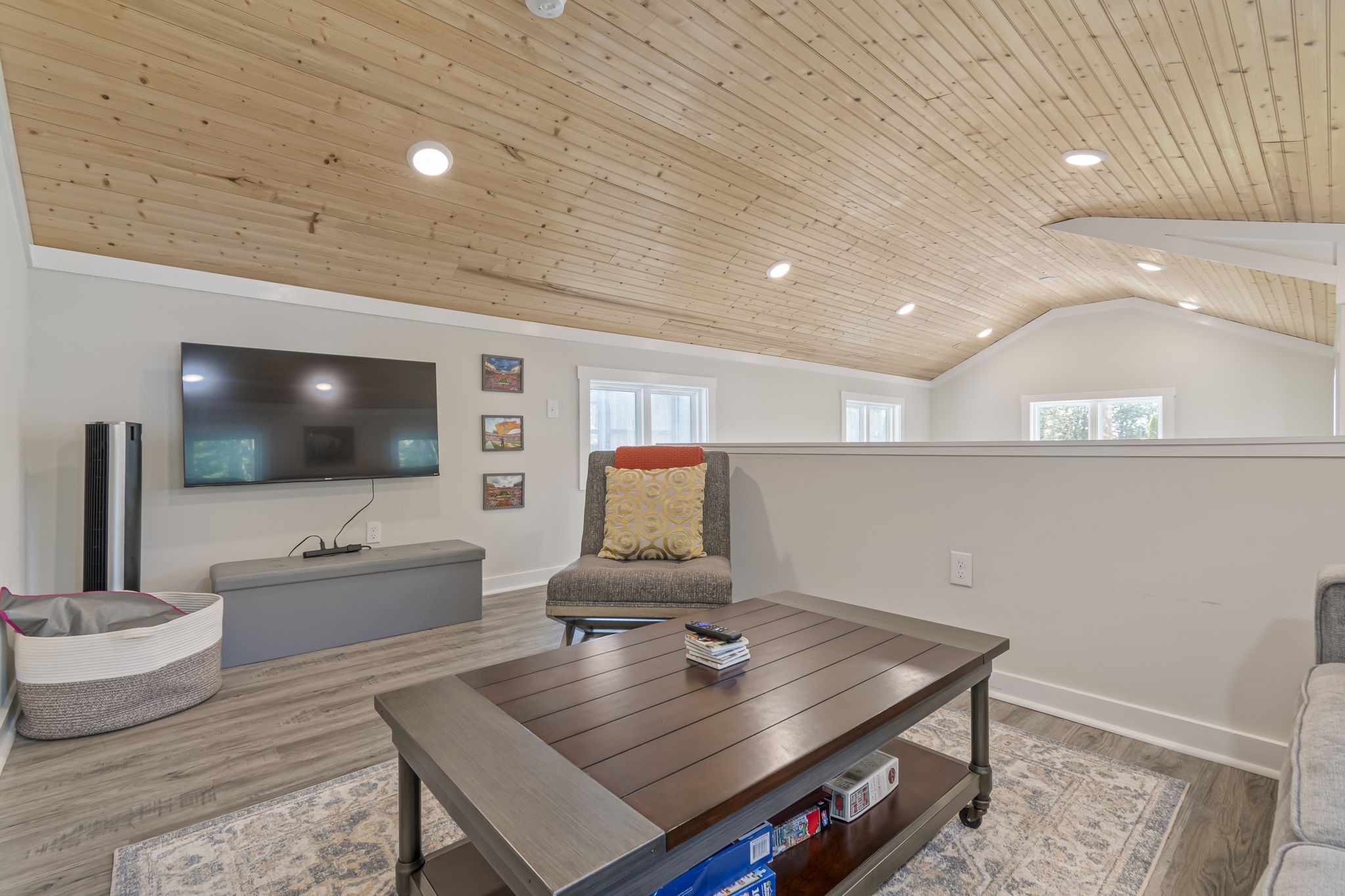 232 Waters Edge Way Tracy City, TN 37387 - Photo 39 of 62 a living room with furniture and a flat screen tv