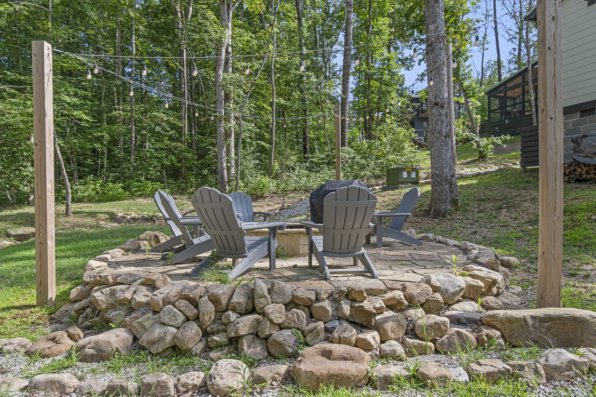 232 Waters Edge Way Tracy City, TN 37387 - Photo 4 of 63 a view of a chairs and table in the garden