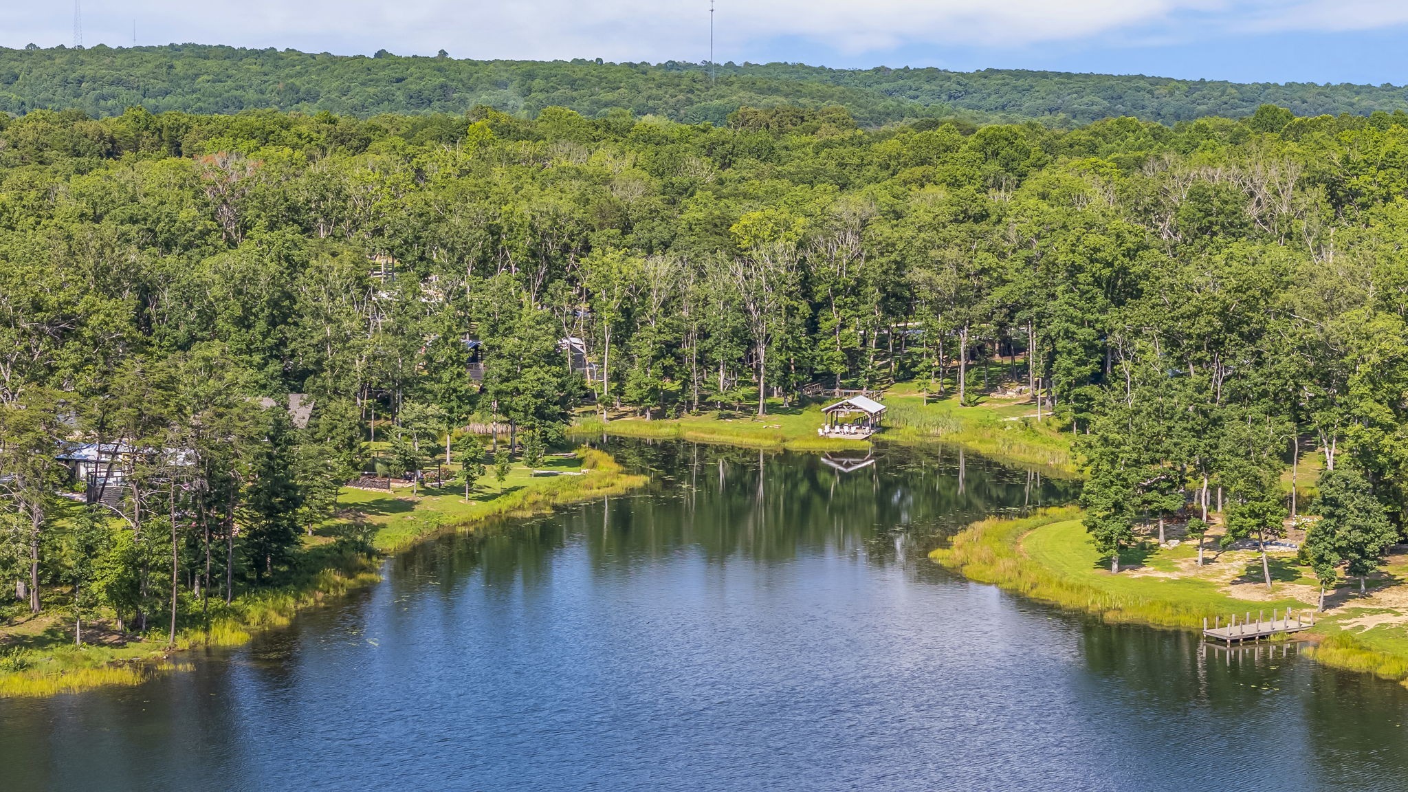 232 Waters Edge Way Tracy City, TN 37387 - Photo 57 of 63 a view of a lake with houses