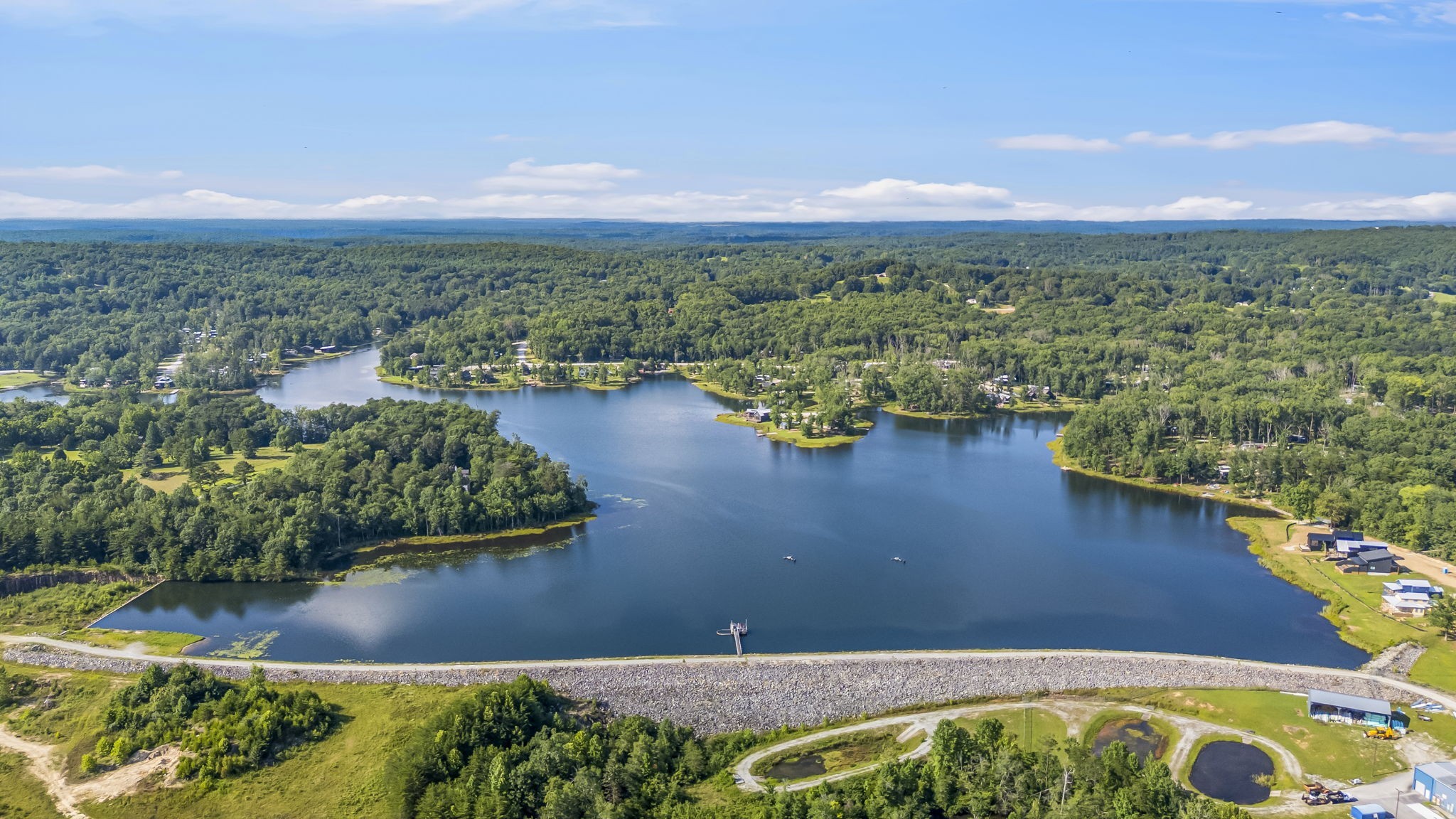 232 Waters Edge Way Tracy City, TN 37387 - Photo 59 of 63 an aerial view of residential house with outdoor space and lake view