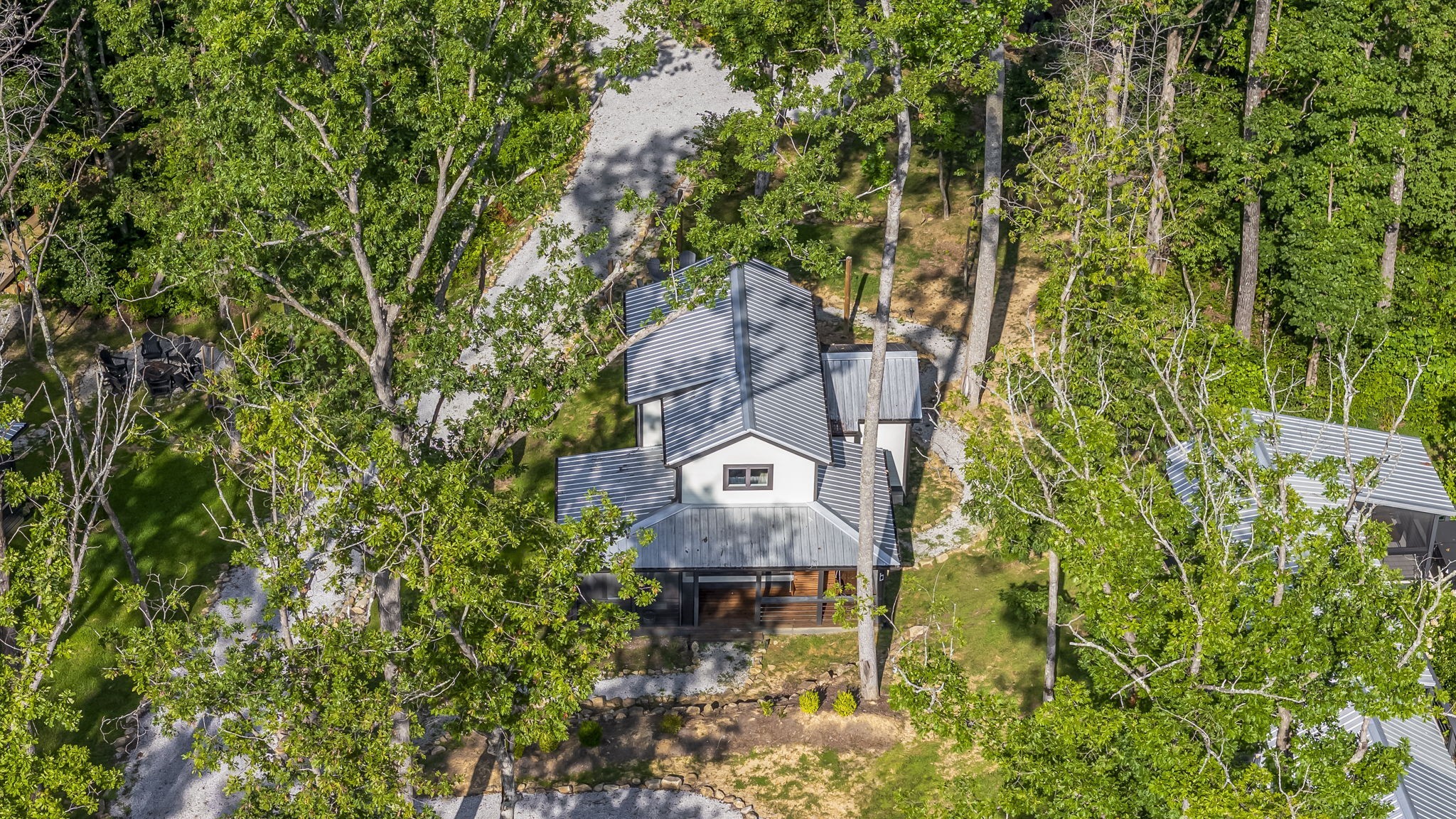 232 Waters Edge Way Tracy City, TN 37387 - Photo 62 of 62 an aerial view of a house with a yard and tree s