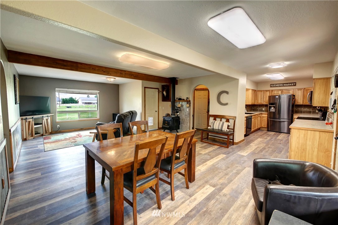 7 Woods Road Omak, WA 98841 - Photo 11 of 39 a living room with furniture and wooden floor
