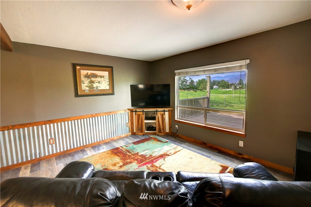 7 Woods Road Omak, WA 98841 - Photo 13 of 39 a bedroom with furniture and a window