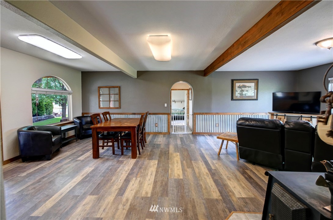 7 Woods Road Omak, WA 98841 - Photo 15 of 39 a living room with furniture and a wooden floor