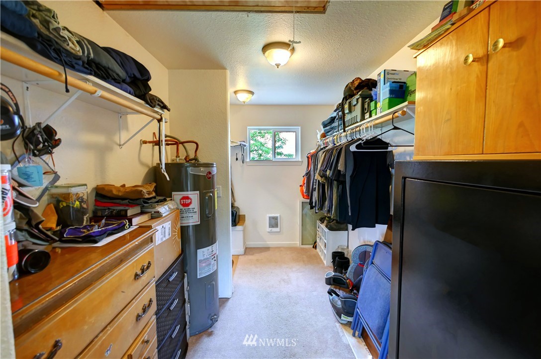 7 Woods Road Omak, WA 98841 - Photo 28 of 39 a view of walk in closet with clothes and shoes