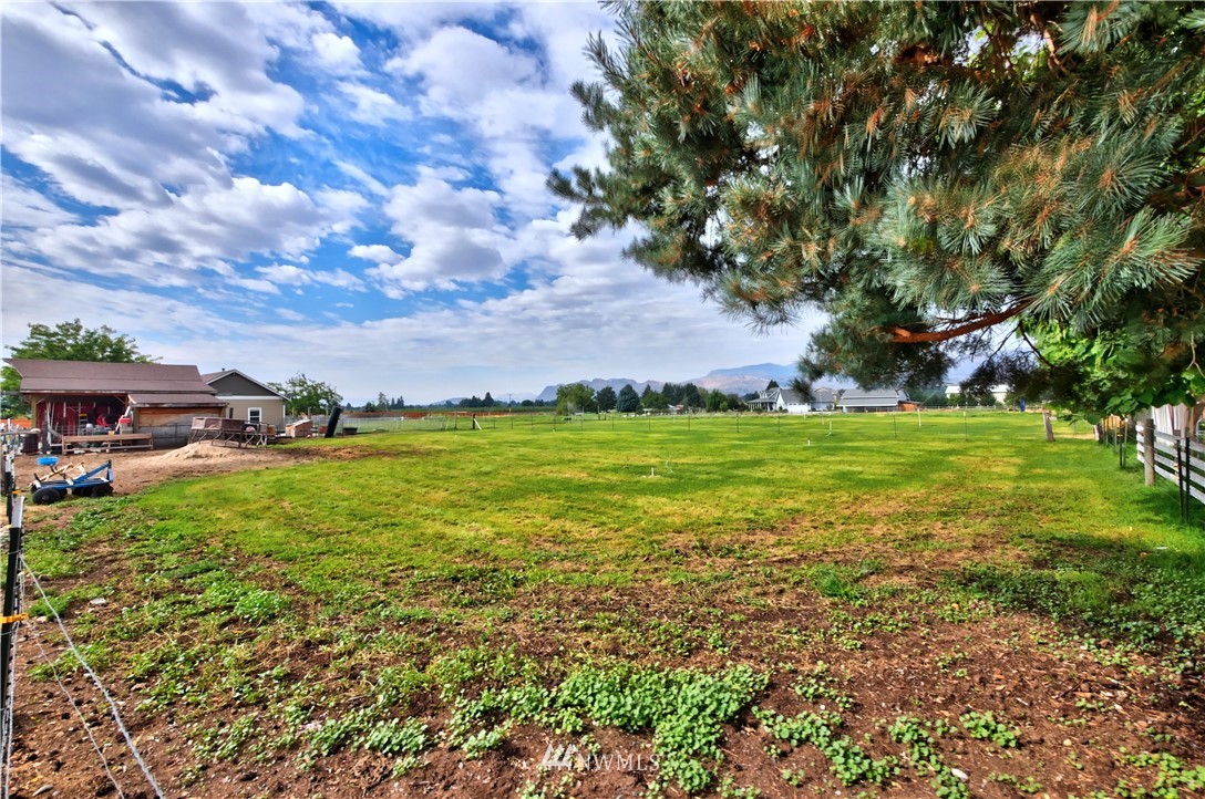 7 Woods Road Omak, WA 98841 - Photo 37 of 39 a view of yard with swimming pool and green space