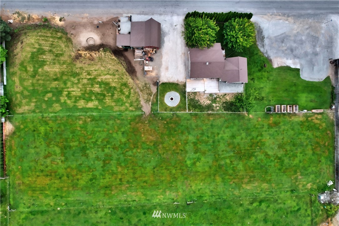 7 Woods Road Omak, WA 98841 - Photo 6 of 39 an aerial view of residential houses with outdoor space and trees