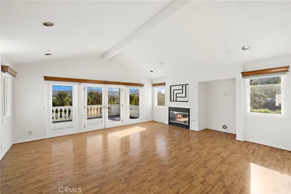 a large living room with a large window