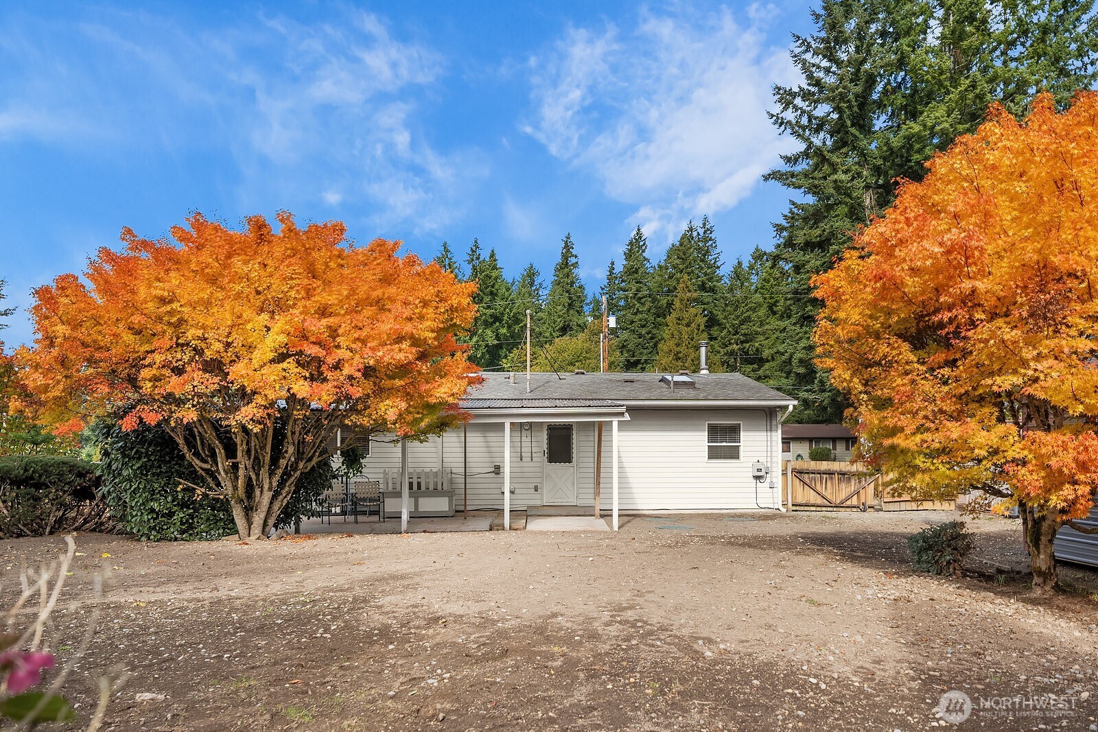 15013 Southeast 113th Street Renton, WA 98059 - Photo 15 of 26 a front view of a house with a yard and garage