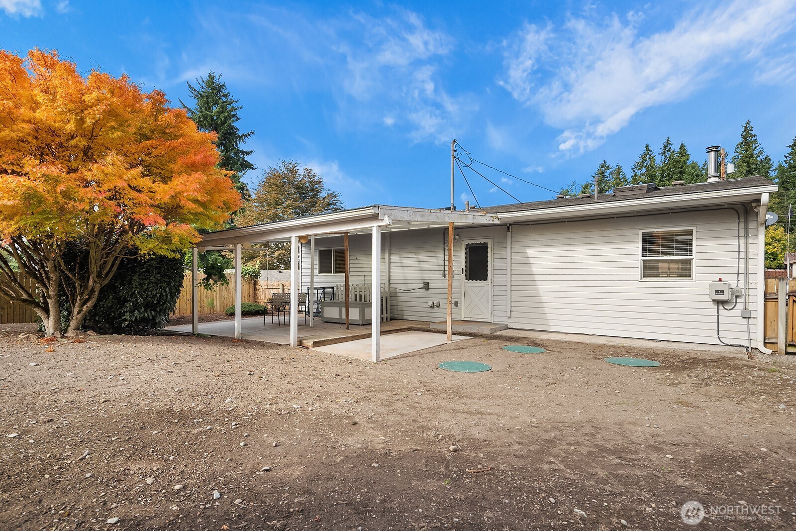 15013 Southeast 113th Street Renton, WA 98059 - Photo 17 of 26 a house with trees in the background