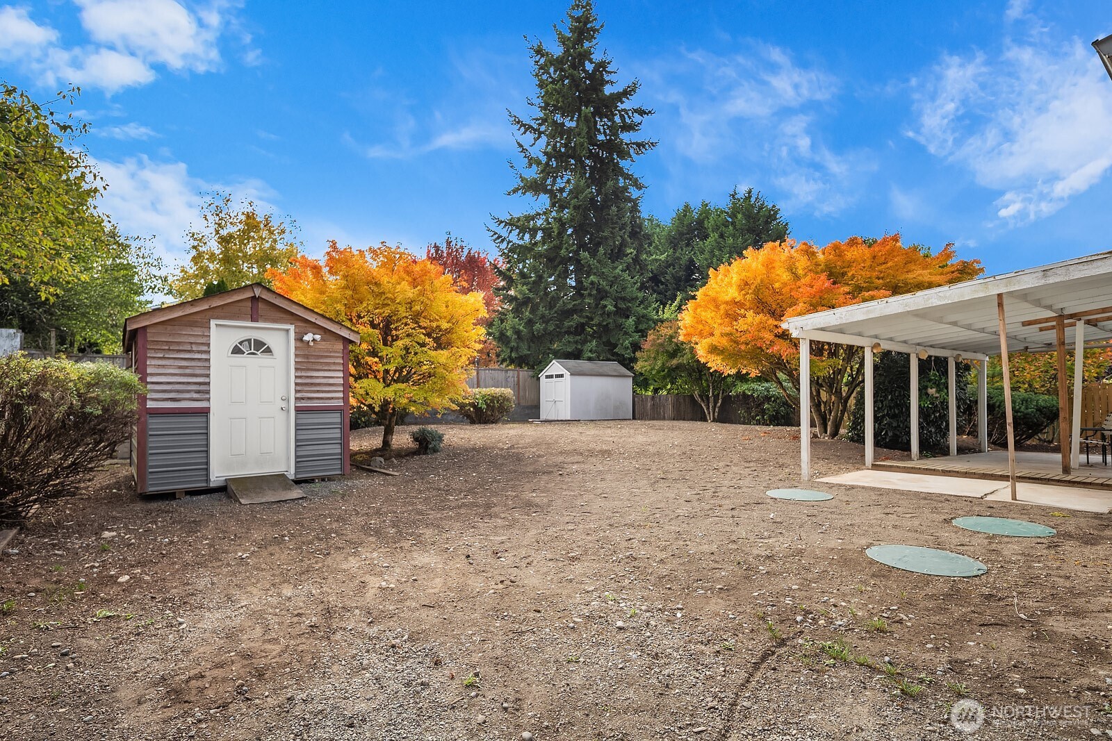 15013 Southeast 113th Street Renton, WA 98059 - Photo 21 of 26 a view of a house with a yard and tree