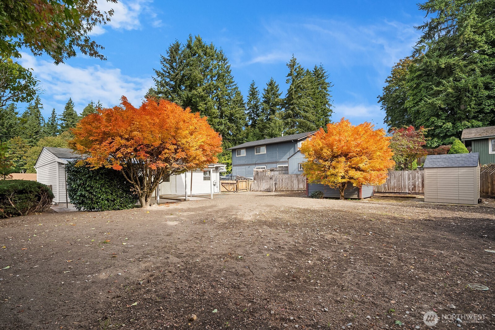 15013 Southeast 113th Street Renton, WA 98059 - Photo 23 of 26 a front view of a house with a yard and garage