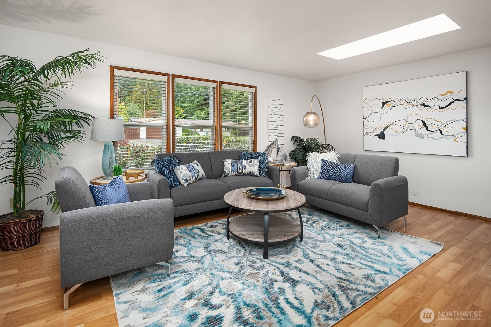 15013 Southeast 113th Street Renton, WA 98059 - Photo 3 of 26 a living room with furniture and a large window
