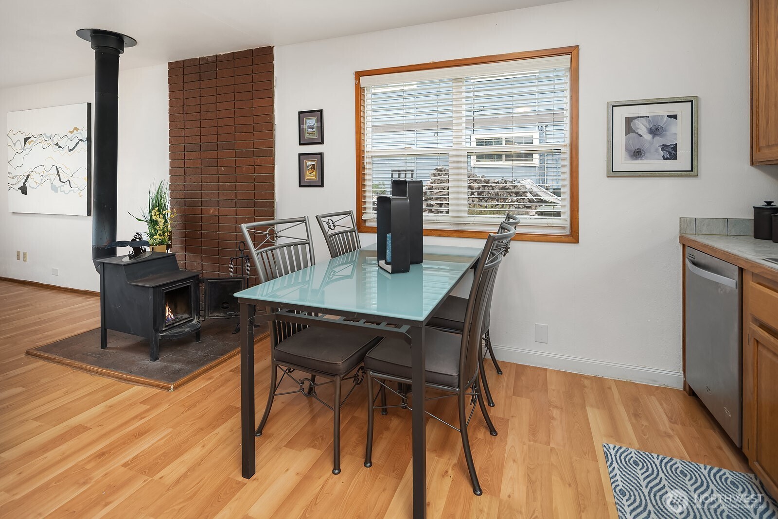 15013 Southeast 113th Street Renton, WA 98059 - Photo 9 of 26 a view of a dining room with furniture window and wooden floor