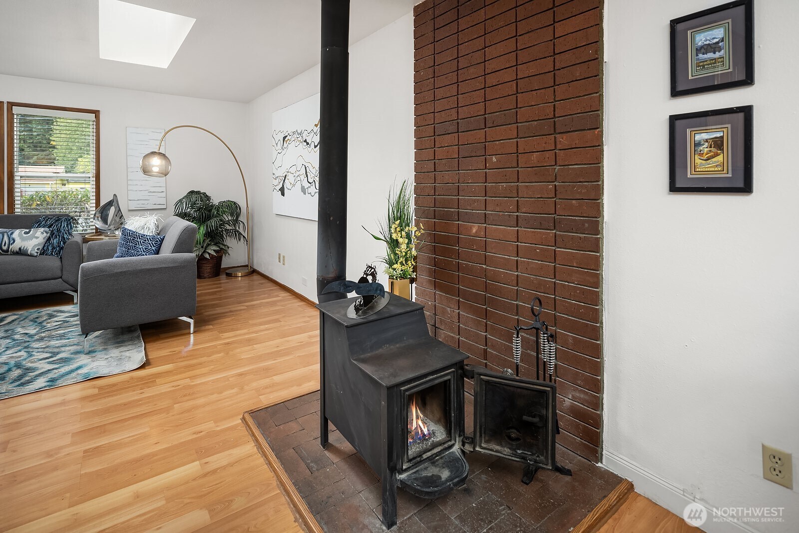 15013 Southeast 113th Street Renton, WA 98059 - Photo 10 of 26 a living room with furniture and wooden floor