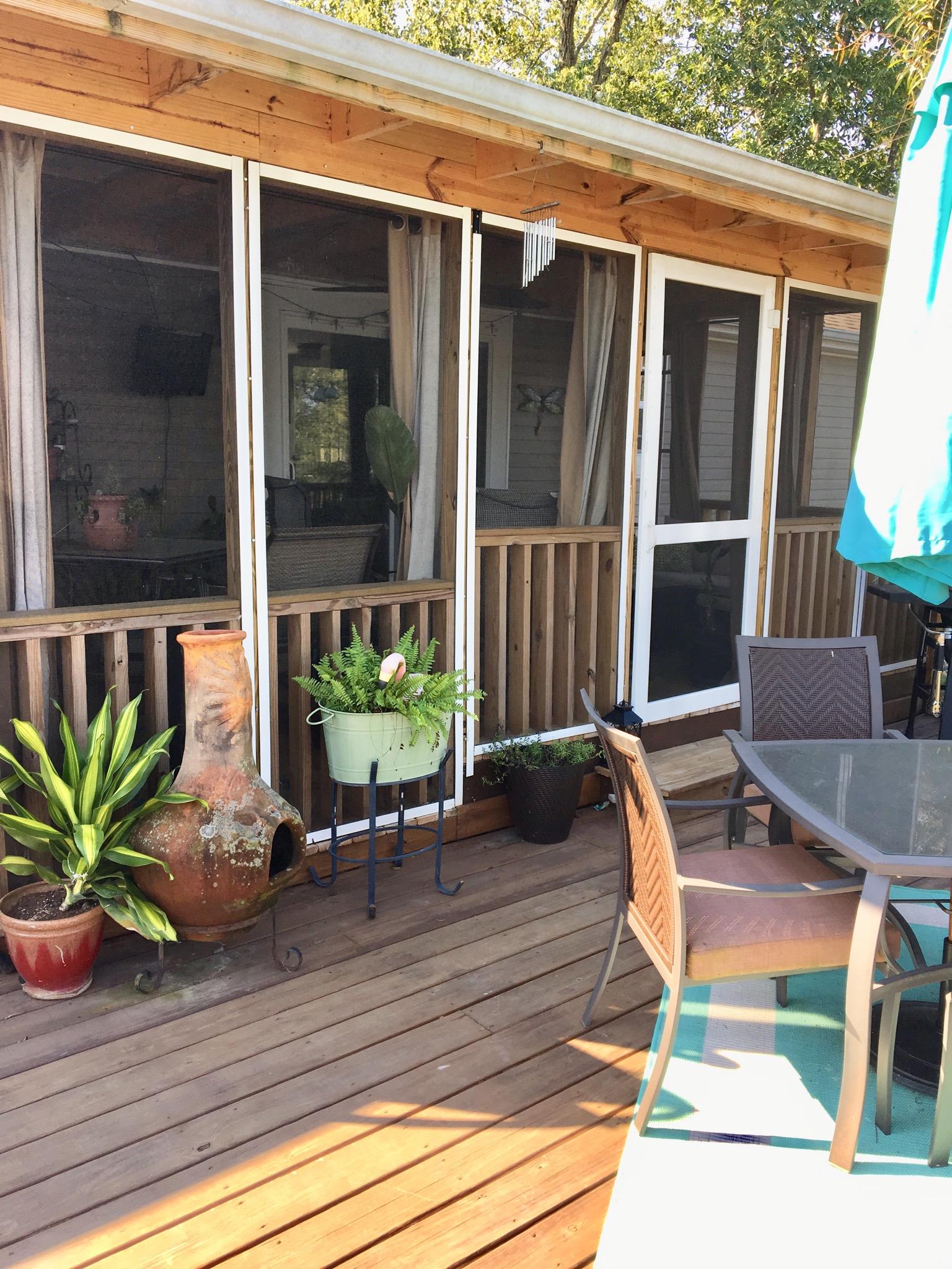 81 Rye Street McEwen, TN 37101 - Photo 12 of 16 Screen porch is great for entertaining.