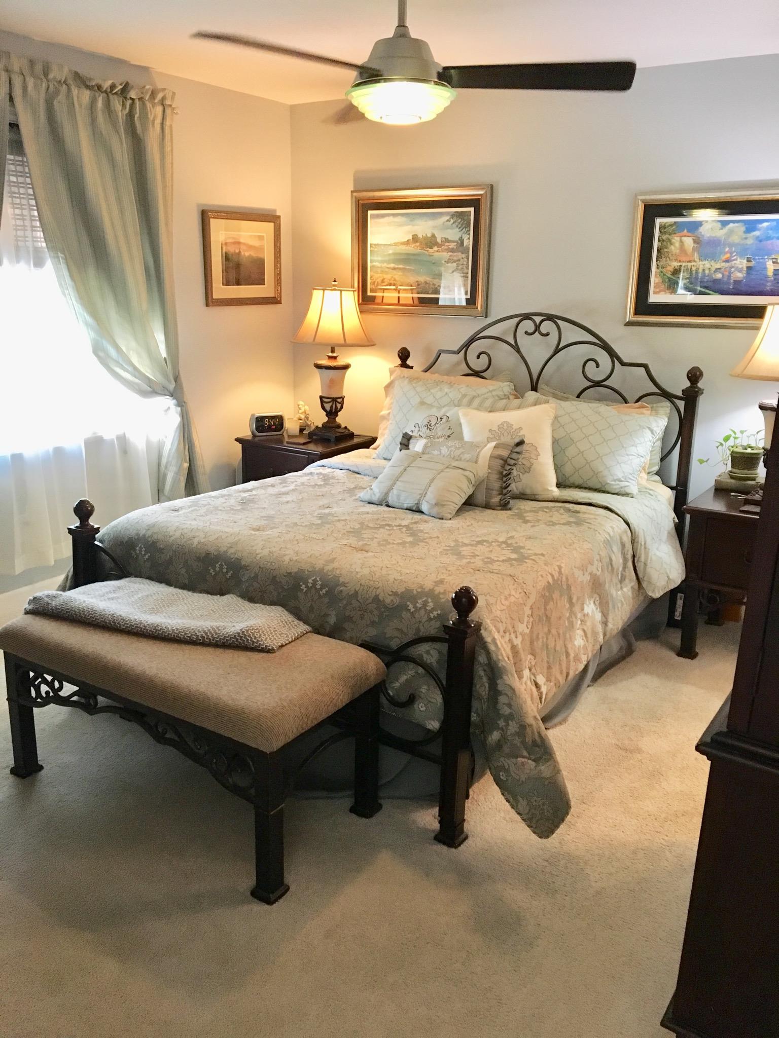 81 Rye Street McEwen, TN 37101 - Photo 5 of 16 Master bedroom with full bath and double vanities.