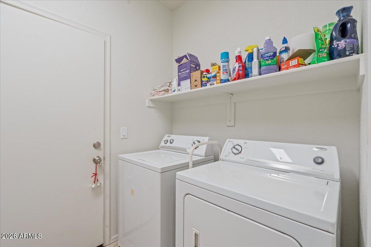 1255 South Rialto, Unit 106 Mesa, AZ 85209 - Photo 24 of 32 a utility room with dryer and washer