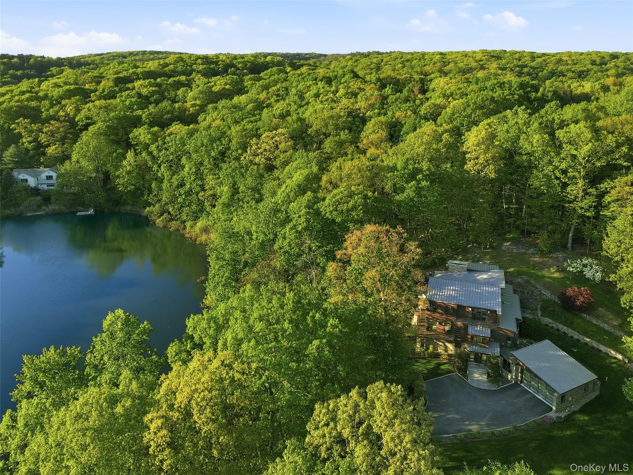 Welcome to Lakeside Serenity at 2 Lakeridge Drive!