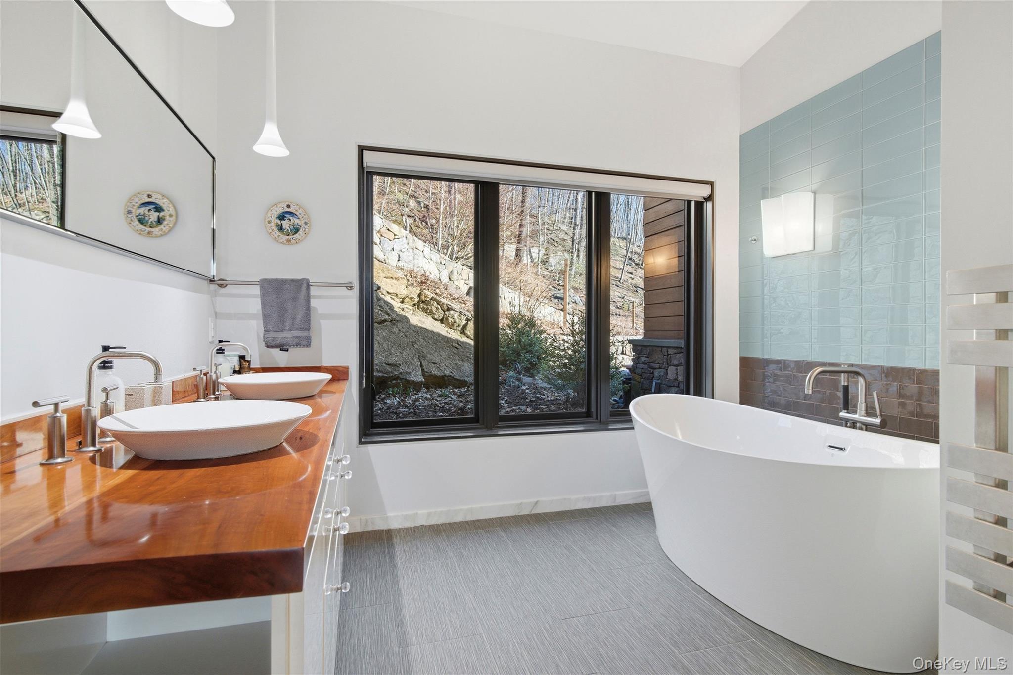 2 Lake Ridge Drive Armonk, NY 10504 - Photo 16 of 38 a bathroom with a bathtub sink and mirror
