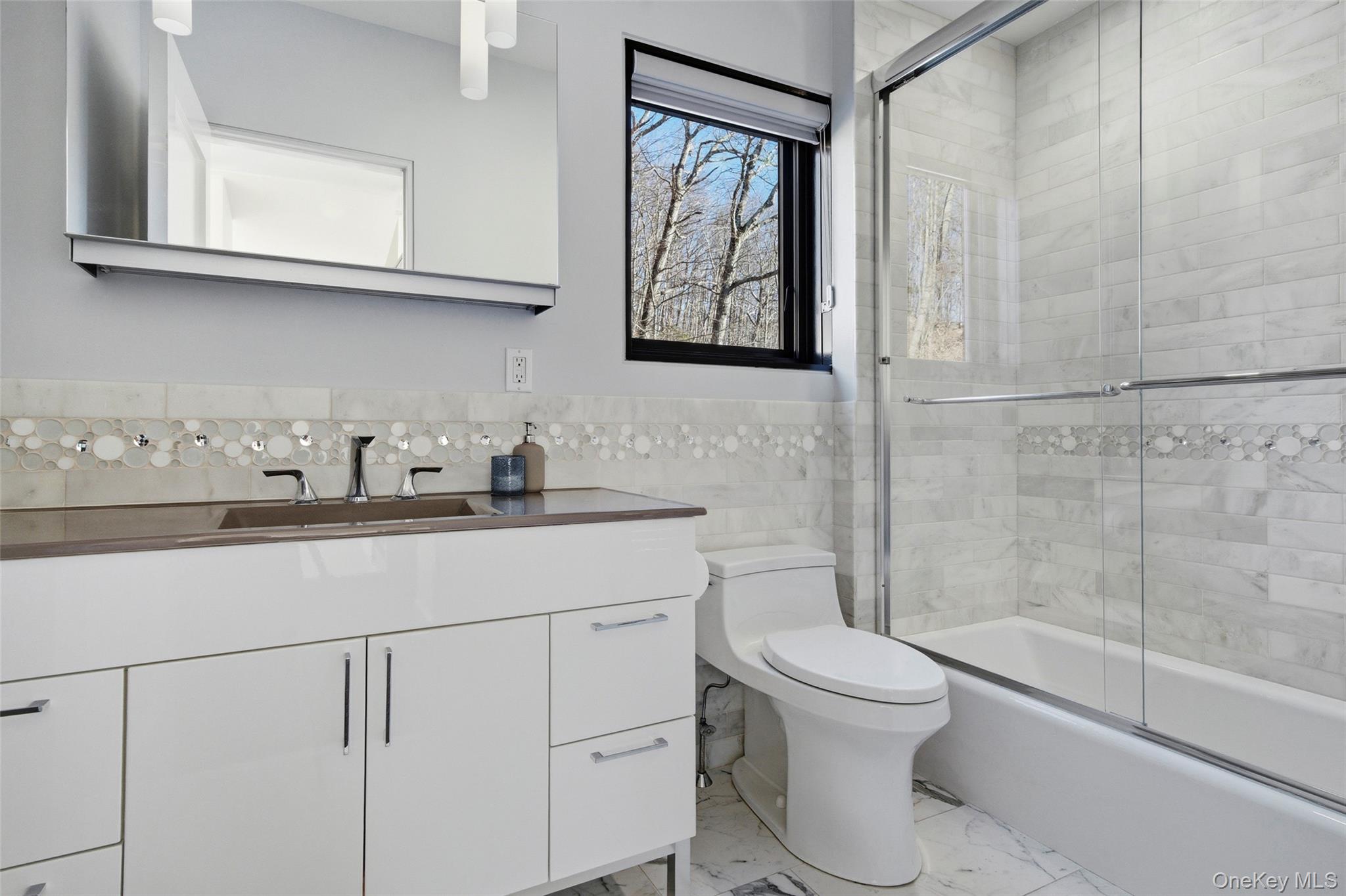 2 Lake Ridge Drive Armonk, NY 10504 - Photo 18 of 38 a bathroom with a toilet sink and shower