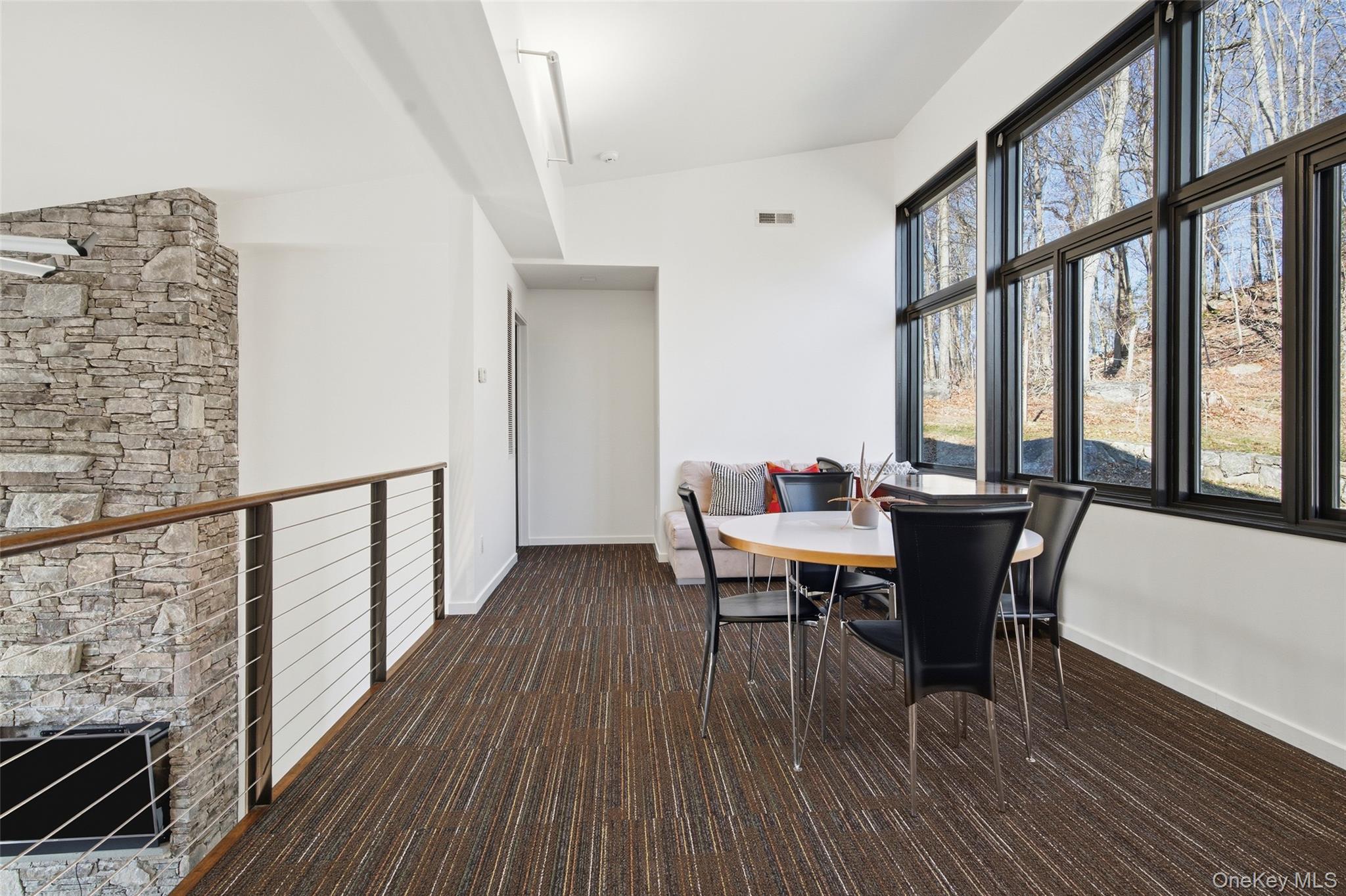 2 Lake Ridge Drive Armonk, NY 10504 - Photo 19 of 38 a view of a dining room with furniture window and wooden floor