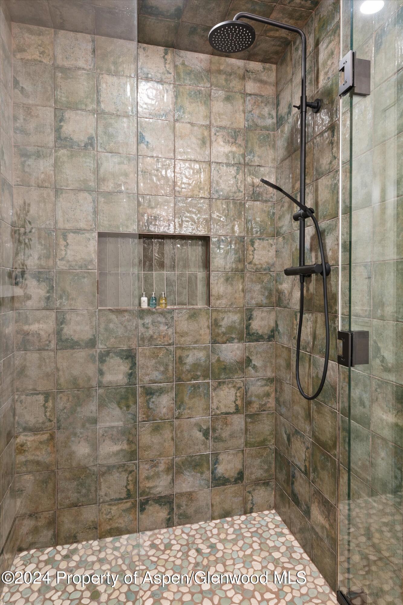 381 Ridge Road, Unit A5 Snowmass Village, CO 81615 - Photo 27 of 43 a bathroom with a shower