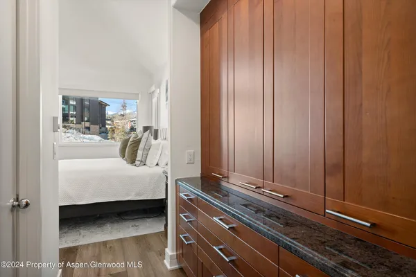 a room with a bed and a table