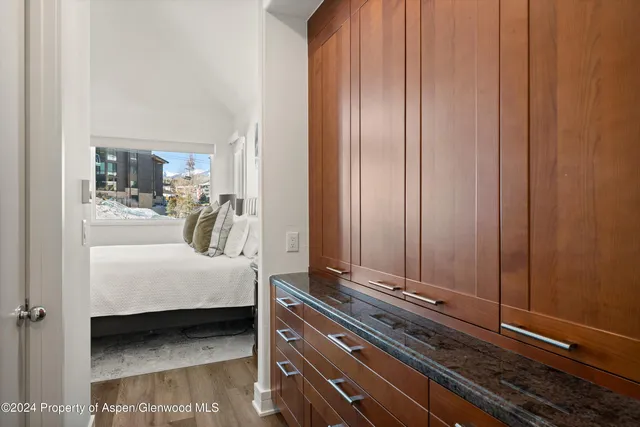 a room with a bed and a table