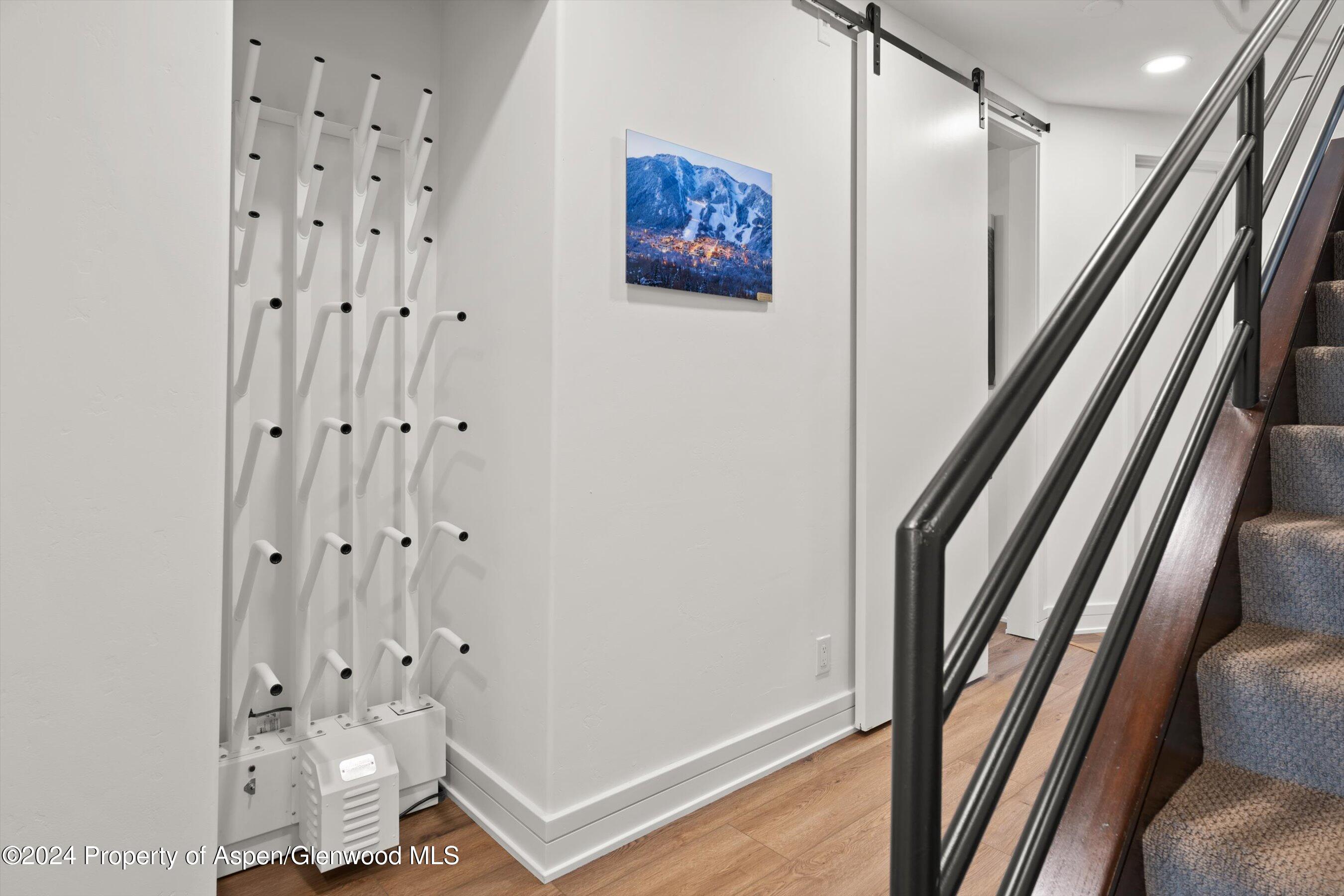 381 Ridge Road, Unit A5 Snowmass Village, CO 81615 - Photo 5 of 43 a view of an entryway with wooden floor
