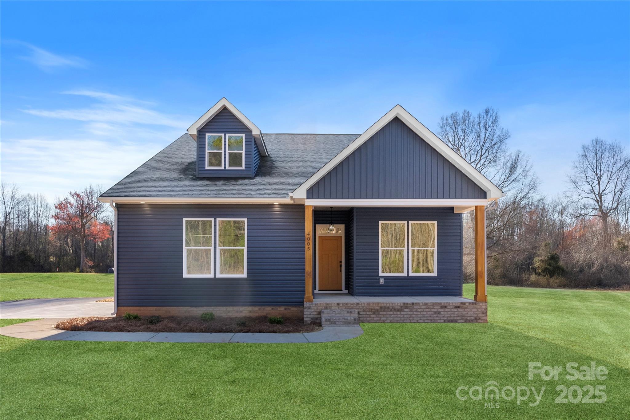 4005 Miller Road Salisbury, NC 28147 - Photo 1 of 46 a front view of a house with a yard