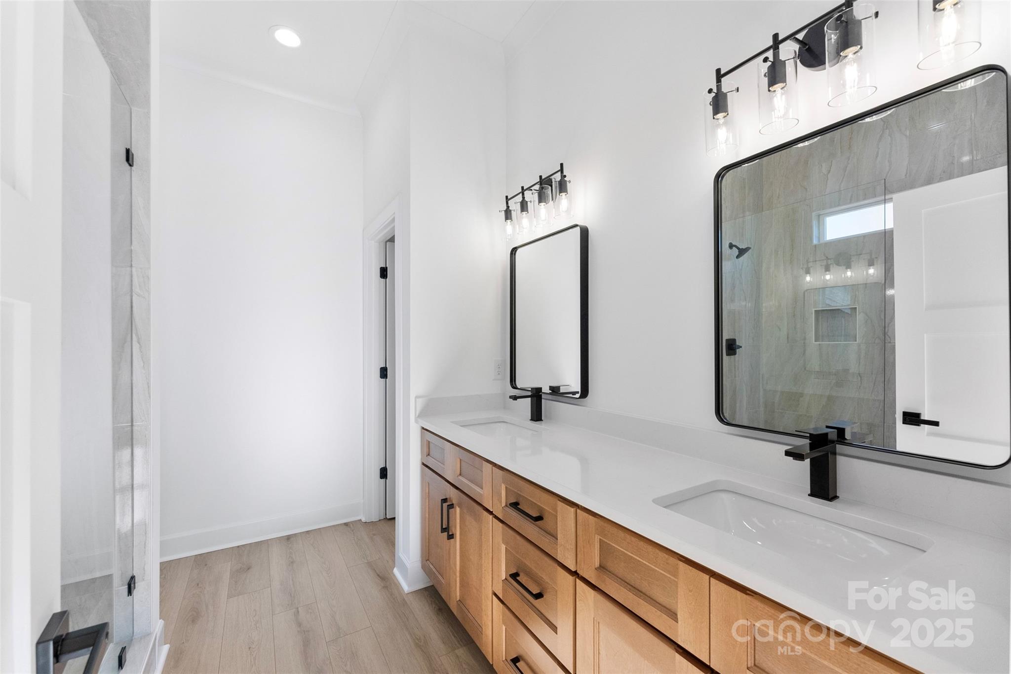 4005 Miller Road Salisbury, NC 28147 - Photo 22 of 46 a bathroom with a sink and mirror