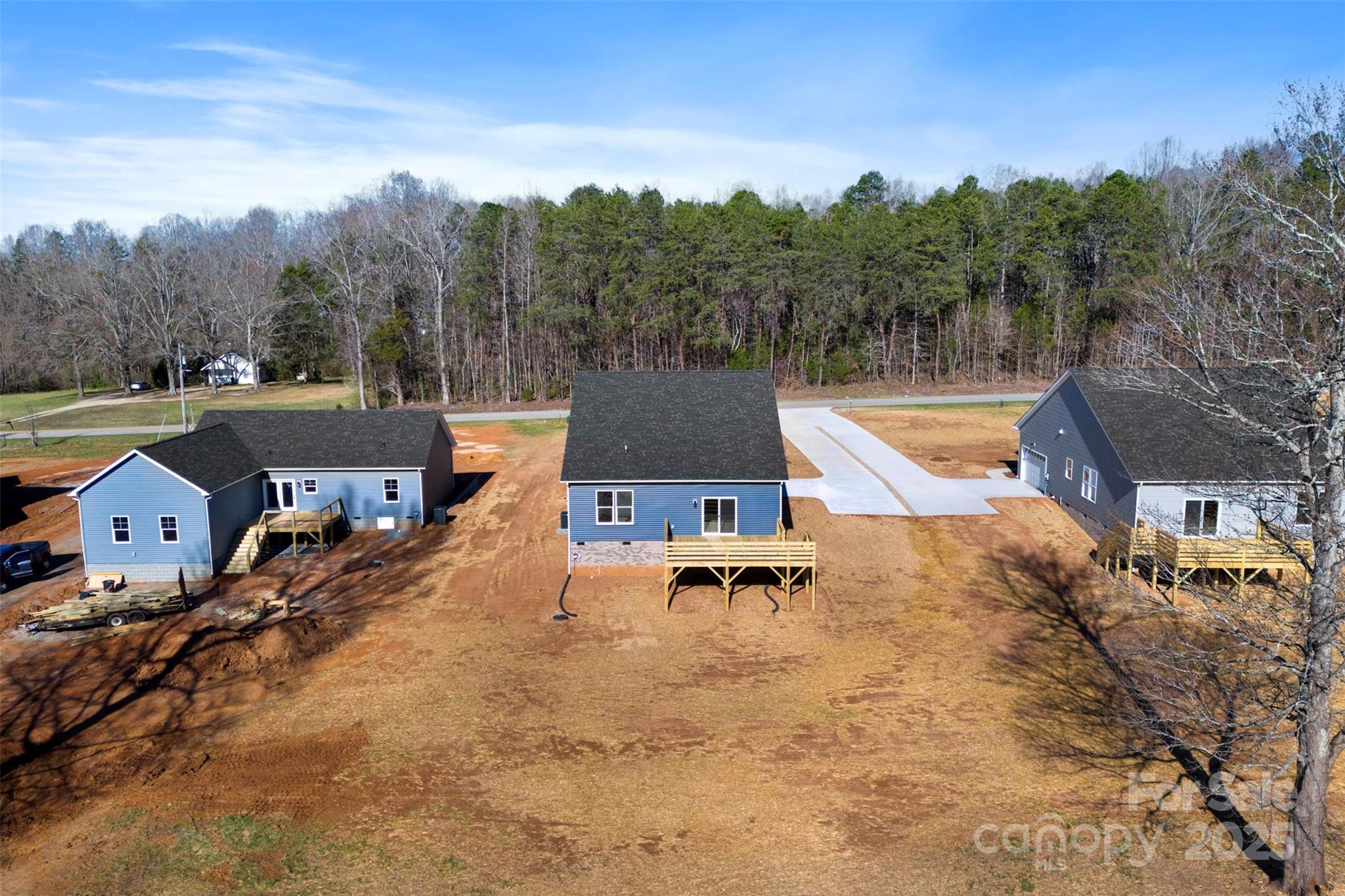 4005 Miller Road Salisbury, NC 28147 - Photo 36 of 46 a view of a swimming pool and trees in the background